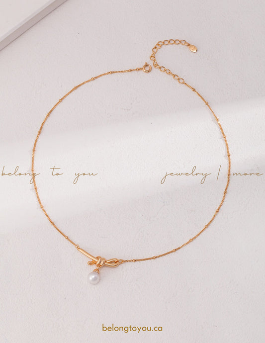 "Knotted Pearl Necklace